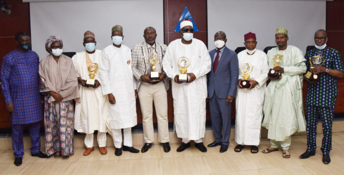 Permanent Secretary, Federal Ministry of Labour and mployment, Peter Tarfa, PhD, (4th Left); Director General, National Productivity Centre, Dr Kasheem Akor (4th right) with the Awardees of the Productivity and Innovations Award in Abuja Permanent Secretary, Federal Ministry of Labour and mployment, Peter Tarfa, PhD, (4th Left); Director General, National Productivity Centre, Dr Kasheem Akor (4th right) with the Awardees of the Productivity and Innovations Award in Abuja