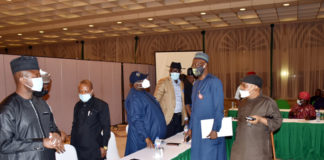 Honourable Minister of Labour and Employment, Dr Chris Ngige (right); Secretary to the Government of the Federation, Boss Mustapha (second left); President, Trade Union Congress (TUC), Comr. Quadri Olaleye (left) during the meeting of Organized Labour with Federal Government in Abuja