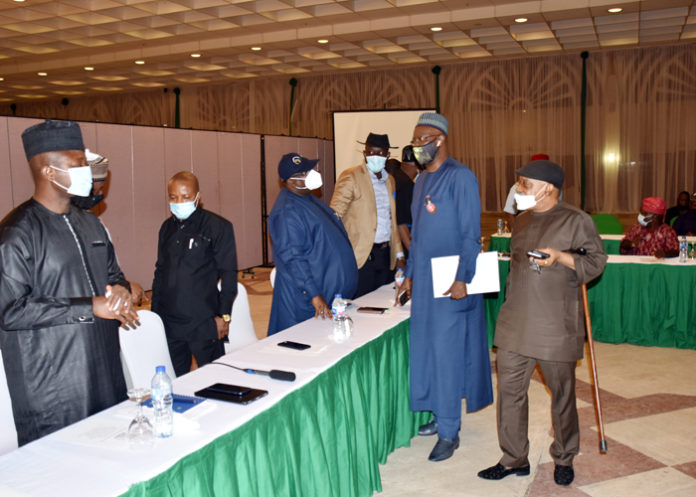 Honourable Minister of Labour and Employment, Dr Chris Ngige (right); Secretary to the Government of the Federation, Boss Mustapha (second left); President, Trade Union Congress (TUC), Comr. Quadri Olaleye (left) during the meeting of Organized Labour with Federal Government in Abuja Honourable Minister of Labour and Employment, Dr Chris Ngige (right); Secretary to the Government of the Federation, Boss Mustapha (second left); President, Trade Union Congress (TUC), Comr. Quadri Olaleye (left) during the meeting of Organized Labour with Federal Government in Abuja