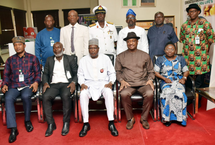 Honourable Minister of State, Labour and Employment, Festus Keyamo SAN (2nd right); Permanent Secretary, Federal Ministry of Labour, Dr Yerima Peter Tarfa (3rd right); Director, Occupational Safety and Health, Mrs. Lauretta Nneka Adogu (right); Chief Inspector of Diving, Julius Orireme Ugwala and other Board members during the inauguration of Diving Governing Board in Abuja Honourable Minister of State, Labour and Employment, Festus Keyamo SAN (2nd right); Permanent Secretary, Federal Ministry of Labour, Dr Yerima Peter Tarfa (3rd right); Director, Occupational Safety and Health, Mrs. Lauretta Nneka Adogu (right); Chief Inspector of Diving, Julius Orireme Ugwala and other Board members during the inauguration of Diving Governing Board in Abuja