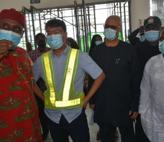Minister of Transportation Mr Rotimi Amaechi; Project Manager China Civil Engineering Construction Corporation (CCECC), Mr Li Depeng, Director of Budget Office of the Federation, Mr Benjamin Akabueze, and Permanent Secretary Ministry of Transport Dr Magdalene Ajani during of the inspection Lagos-Ibadan rail project