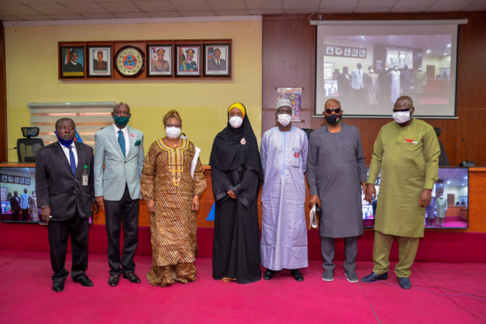 FMHADMSD, IDPWD (Middle) The Honorable Minister, Humanitarian Affairs, Disaster Management and Social Development, Sadiya Umar Farouq,(From R) Special Assistant to the Minister on Special Needs, Office of the Honourable Minister, Danjuma Attach, Director Human Resource Management, Abdulrahman Babatunde Jaji, Director Humanitarian Affairs, Grema Ali Alhaji, Director Special Needs, Mrs Onwukwue Nkechi Florence, Director Finance and Account, Mathew Dada, Director Legal, Garba Haganawega, During the press briefing organized to mark the 2020 International Day for Persons With Disabilities, at the Nigerian Army Resource Centre, Abuja, on 1st December, 2020. Photo Khalid Ahmed.