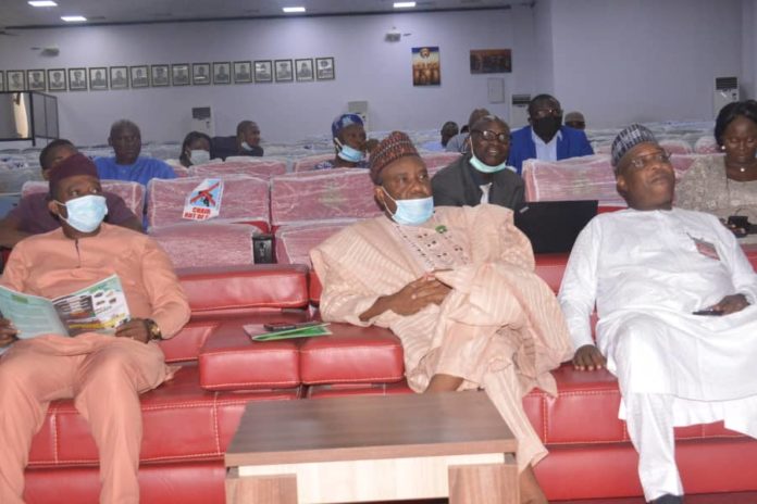 The Representative of the Permanent Secretary, Director, Farms Inputs Support Services, Engr. Tunde Bello, Chairman, House of representatives, Committee on Agricultural Colleges and Institutions, Hon. Munir Dan Agundi and Director, Federal Department of Agricultural Extension, Engr Frank Kudla, representing the Hon. Minister, during the the Sensitization Workshop on the Revitalization of Agricultural Extension in Nigeria