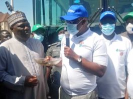 The Minister of State, Petroleum Resources presenting keys of CNG powered Mass Transit Buses to organized Labour