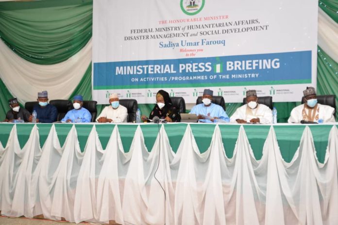 FMHADMSD, IDPWD, (4th R) The Honourable Minister of Humanitarian Affairs, Disaster Management and Social Development, Sadiya Umar Farouq, (5th R) The Honorable Minister of State, Science and Technology, Muhammed Abdullahi, (1st R) Member House of Rep, (2nd R) Chairman Senate Committee on Poverty Eradication, (3rd R)Permanent Secretary, Humanitarian Affairs, Disaster Management and Social Development, Bashir Nura Alkali, (From Left) NEDC representative, Musa Yashi, Chairman House Committee on Internally Displaced Persons(IDP), Hon. Muhammed Jeda, Director General, National Emergency Management Agency( NEMA) Mohammed Mohammad, during the 2020 Ministerial Press Briefing on Activities/Programmes of the Ministry, 30th November, 2020, at the National Press Centre, Radio House, Abuja. Photo: Khalid Ahmed.