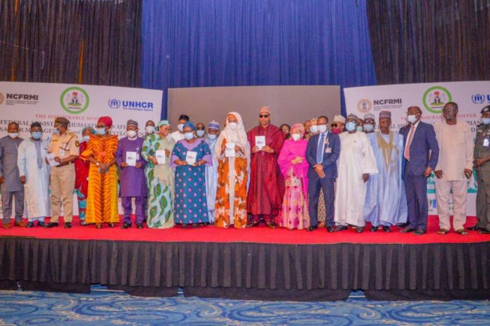 FMHADMSD. UNHCR (8th L) The Honourable Minister of Humanitarian Affairs, Disaster Management and Social Development, Sadiya Umar Farouq, (7th L) Country Rep. UNHCR, Mme Chansa Kapaya,(5th l) , Representative of Hon. Federal Commissioner for Refugees, Migrants and Internally Displaced Persons, Ejibunu Tai Hassan, (7th R) The Governor of Borno State, His Excellency, Babagana Umara Zulum, (6th R) Representative of the Honourable Minister of Agriculture, Hajiya Karima Babangida, and others