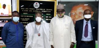 HMIC, Alh. Lai Mohammed receiving PAWA Exec Secretary