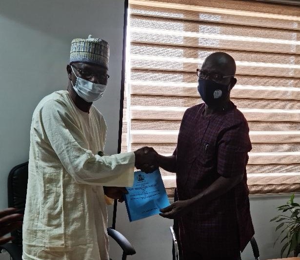 Ecosystem Engr. Festus Yusufu Daudu of the Federal Ministry of Communications and Digital Economy and Permanent Secretary, Political and Economic Affairs, Mr. Andrew David Adejo at the conference room of the Political and Economy Affairs Office of OSGF, Shagari House.