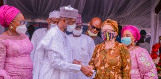 (1st Left) Representative of the Honourable Minister of Humanitarian Affairs, Disaster Management and Social Development, The Permanent Secretary of the Ministry, Bashir Nura Alkali, (2nd Left) The Deputy Governor, Lagos State, His Excellency Dr. Kadiri Obafemi Hamzat, (3rd Left) Honourable Commissioner Ministry of Wealth Creation and Employment, Honourable. Mrs Yetunde Arobieke, (1st Right) Director Humanitarian Affairs, Grema Ali Alhaji, (3rd Right) a Beneficiary, oluwatoyin Alade, during the Federal Government Special Grants for Rural Women in Lagos, held at Police College Ground Oba Akinjobi Way, G.R.A Ikeja, on the 29th, January, 2021. Photo: Khalid Ahmed.