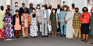The Permanent Secretary, Federal Ministry of Labour and Employment, Dr Yerima Peter Tarfa (6th Left) Director Special Duties and Project, Dr Martina Nwordu, in a group photograph with participants at a workshop on Anti-Corruption and Whistle-Blowing Policy in Abuja