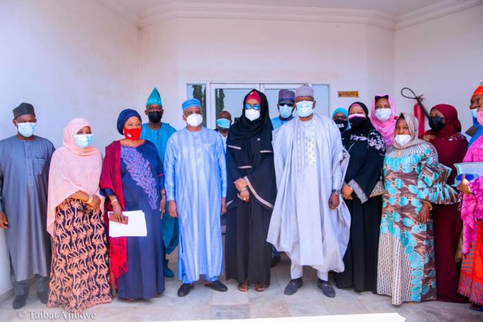IMG-20210215-WA0000 Fifth from the left is the Hon. Minister of Humanitarian Affairs, Sadiya Umar Farouq, 3rd left Adviser/ Focal Person NSIP Hon. Barr. Amina Musa Gu'ar, 1st left DG NEMA, AVM Basheer Muhammadu Muhammed, 2nd left, Perm. Sec. Women Affairs, Hajia Salamatu Aminu mini, 4tth left Minister of State Foreign Affairs Amb. Zubaru Dada, 6th left SSG Niger, Ibrahim Matani and others during the Flag- Off of the Federal Government special cash grant for Rural Women at Government House, Minna, Niger State.