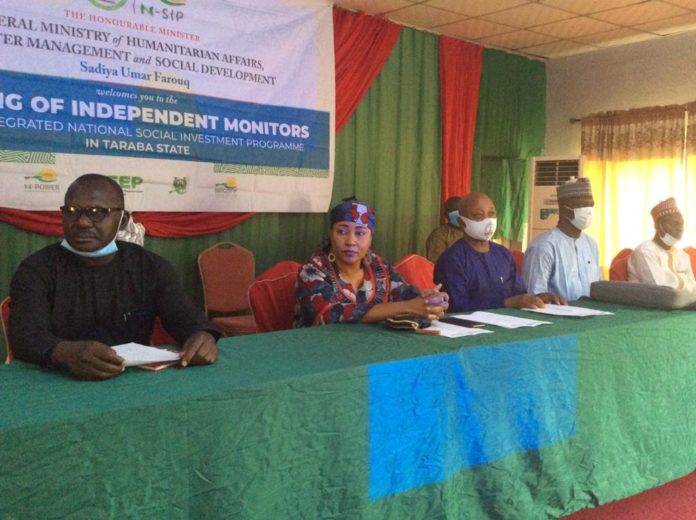 (1st left) Representative of the Honourable Minister of Humanitarian Affairs Disaster Management and Social Development, Sadiya Umar Farouq, Chief Administrative officer in the Ministry, Wiyeh Silas, (2nd left), Taraba State Focal Person, Beatrice Kichitna, (3rd left) Taraba State Director, NOA, N. B. Nyama, and others during the training of independent monitors for NSIP in Taraba State, 22nd February, 2021