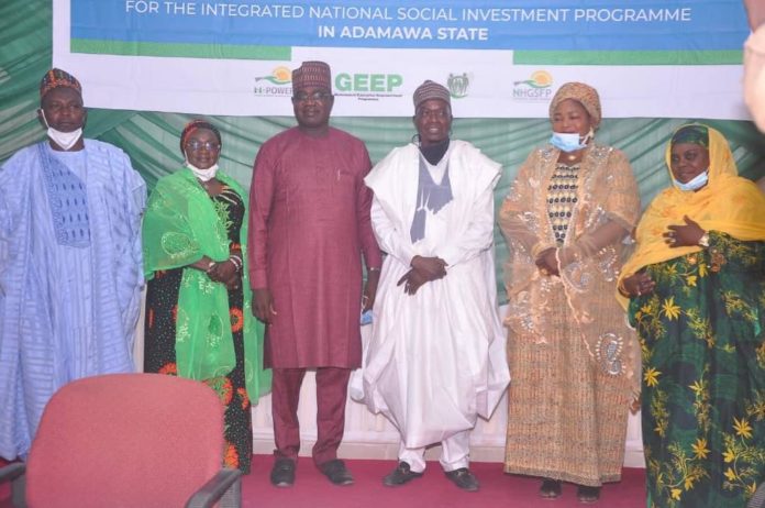 (3rd Right) Representative of the Honourable Minister of Humanitarian Affairs, Disaster Management and Social Development , Sadiya Umar Farouq, Dr. Umar Bindir , (2nd left) Mrs Hauwa Gadzama (2nd Right) Adamawa State Focal Person, Mary Yuwadi (1st Left) State Dïrector ,National Orientation Agency (NOA) Mohammed Bashi (1st Right) Programme Manager, Home Grown School Feeding, Hauwa Dattijo Hamaja, during the training of independent monitors for NSIP in Adamawa State, 25th February, 2021