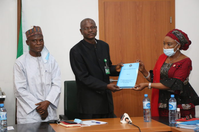 L-R: Chief Operating Officer, NIPOST, Mr. Yahaya Ahmadu Rufai, Permanent Secretary, Federal Ministry of Communications and Digital Economy, Engr. Festus Yusufu Daudu and National Coordinator/Chief Executive Officer, SERVICOM, Mrs. Nnenna Akajemili during the official presentation of the SERVICOM Compliant Evaluation Report on NIPOST to the Ministry at its headquarters in Abuja.