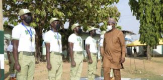 Hon. Minister of Youth and Sports Development, Mr. Sunday Dare inspecting Corp Members during his working visit to the NYSC Orientation Camp, Kubwa Abuja
