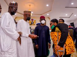 (2nd Left) The Representative of the Honourable Minister of Humanitarian Affairs, Disaster management and Social Development, The Permanent Secretary of the Ministry, Bashir Nura Alkali, (2nd Right) the Representative of the Abia State Governor, the Deputy Governor of the State, Hon. Sir, Ude Oko Chukwu, (1st Leftt) Director Humanitarian Affairs, Grema Ali Alhaji, (1st Right) a Beneficiary of the Grant, a woman with disability, Nnaji Uroma, during the disbursement of the Federal Government cash Grant for Rural Women in Abia State, on 5th March, 2021