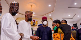 (2nd Left) The Representative of the Honourable Minister of Humanitarian Affairs, Disaster management and Social Development, The Permanent Secretary of the Ministry, Bashir Nura Alkali, (2nd Right) the Representative of the Abia State Governor, the Deputy Governor of the State, Hon. Sir, Ude Oko Chukwu, (1st Leftt) Director Humanitarian Affairs, Grema Ali Alhaji, (1st Right) a Beneficiary of the Grant, a woman with disability, Nnaji Uroma, during the disbursement of the Federal Government cash Grant for Rural Women in Abia State, on 5th March, 2021