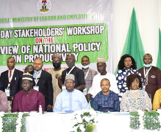 The Permanent Secretary Federal Ministry of Labour and Employment Dr. Yerima Peter Tarfa (4th left); the Deputy President, NLC Comrade Joe Ajaero (4th right); DG NPC, Dr Kashim Akor (2nd left); Director, Productivity Measurement and Labour Standards, Dan Neburagho (1st right); Director General, Micheal Imodu Institute of Labour Studies, S. I. Alabi (1st left) and other participants at the Stakeholders Workshop on the Review of National Policy on Productivity in Abuja.