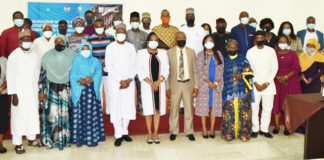 Permanent Secretary, Federal Ministry of Labour and Employment, Dr Yerima Peter Tarfa PhD (5th left) with the participants of the Validation of the National Policy on Child Forced Labour and the National Action Plan on the Elimination of Child Force Labour 2021 – 2025, in Abuja