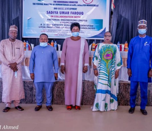 (2nd Right) The Representative of the Honourable Minister of Humanitarian Affairs, Disaster Management and Social Development, Sadiya Umar Farouq, Director Special Needs, Mrs Florence Nkechi Onwukwe, (1st Left) the Representative of the Permanent Secretary of the Ministry, Chief Community Development Officer, Garba Magaji, (Middle) the Representative of the Honourable Commissioner Women Affairs, Benue State, Eunice Tachia Terumbur, (1st Right) the Representative Resource Person, Kolawole Taiwo, (2nd Left) the Representative Consultant Factorial Engineer Limited Workshop, Charles Ofonimeh, during the Opening ceremony of the 3-Day Capacity Building to Identify Local Producers of Assistive Technologies. On the 21st April, 2021, in Markurdi, Benue State. Photo: Khalid Ahmed.