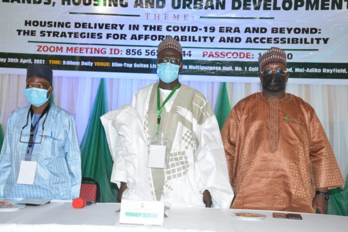 Middle- Alhaji Babangida Hussain, Permanent Secretary, Federal Ministry of Works and Housing, Left- Dayyabu Garga, Commissioner for Physical Planing and Urban Development, Plateau State Right- Arc Labafilo, Director Public Building, Federal Ministry of Works and Housing Middle- Alhaji Babangida Hussain, Permanent Secretary, Federal Ministry of Works and Housing, Left- Dayyabu Garga, Commissioner for Physical Planing and Urban Development, Plateau State Right- Arc Labafilo, Director Public Building, Federal Ministry of Works and Housing