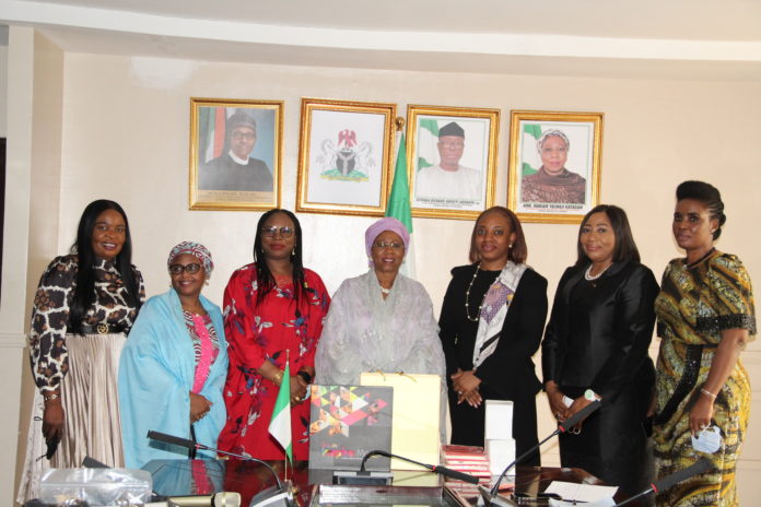 FMITI The Minister of State for Industry, Trade and Investment, Amb. Mariam Yalwaji Katagum (Centre) with the executive members of Women in Management, Business and Public Service (WIMBIZ) when the association paid a courtesy visit to the Minister in Abuja recently.