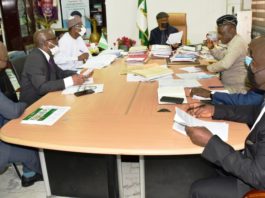 The Honourable Minister of Labour and Employment, Dr Chris Ngige (4th left); Senior Special Assistant to the President on Niger Delta Affairs, Eta Enang; Permanent Secretary, Federal Ministry of Labour and Employment, Dr Yerima Peter Tarfa and other Government Representatives harmonizing report on resolutions of the Strike action by JUSUN in Abuja