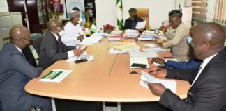 The Honourable Minister of Labour and Employment, Dr Chris Ngige (4th left); Senior Special Assistant to the President on Niger Delta Affairs, Eta Enang; Permanent Secretary, Federal Ministry of Labour and Employment, Dr Yerima Peter Tarfa and other Government Representatives harmonizing report on resolutions of the Strike action by JUSUN in Abuja