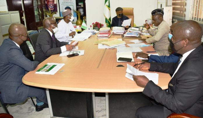The Honourable Minister of Labour and Employment, Dr Chris Ngige The Honourable Minister of Labour and Employment, Dr Chris Ngige (4th left); Senior Special Assistant to the President on Niger Delta Affairs, Eta Enang; Permanent Secretary, Federal Ministry of Labour and Employment, Dr Yerima Peter Tarfa and other Government Representatives harmonizing report on resolutions of the Strike action by JUSUN in Abuja