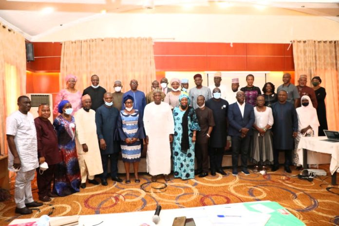 Perm. Sec. Ministry of Interior (7th Left), in a group photograph with the top management officers of the Ministry and the training Consultant at a 3-day workshop on Performance Management System for Directorate Cadre officers, organized by the Ministry in Abuja .