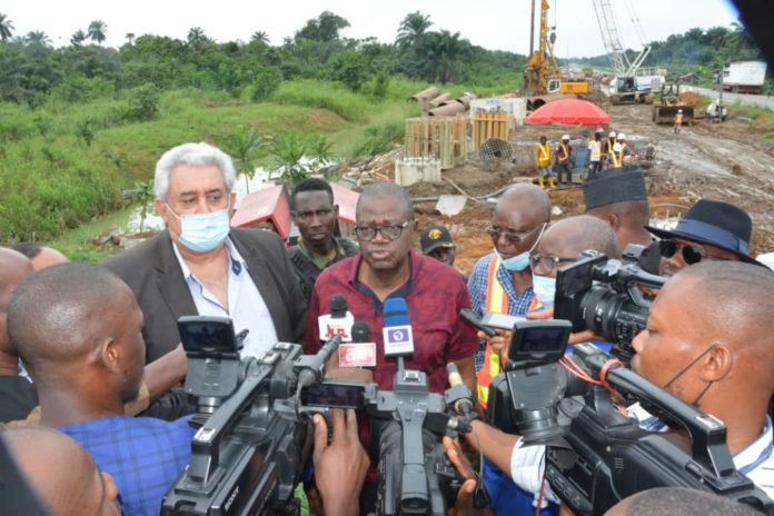 The Honourable Minister of State, MNDA, Sen. Omotayo Alasoadura and Chief Engineer, RCC, Zavontenik Igor granting interview at the Deck-on-Pile Bride KM59+600 (Imo River) during the Inspection of the East-West road on Thursday 20th, May, 2021.