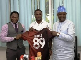 R-L: Hon. Minister of Youth and Sports Devlpt. Mr. Sunday Dare; holding Manchester United Jersey bearing IGHALO No. 89: with Odion Ighalo (Middle); and Daniel Amokachie, S.A. Sports to Mr. President.