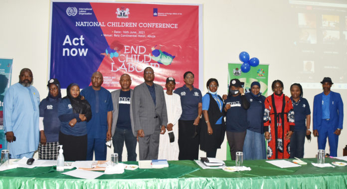 Permanent Secretary Federal Ministry of Labour and Employment, Dr Yerima Peter Tarfa (6th left) with other dignitaries during 2021 World Day against Child Labour (WDACL) in Abuja