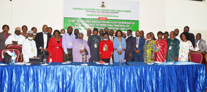 Director Occupational Safety and Health, Mrs. Adogu N. Lauretta with participants at the National Sensitization Workshop for the Ratification of the Promotional Framework for Occupational Safety and Health Convention 2006, Abuja