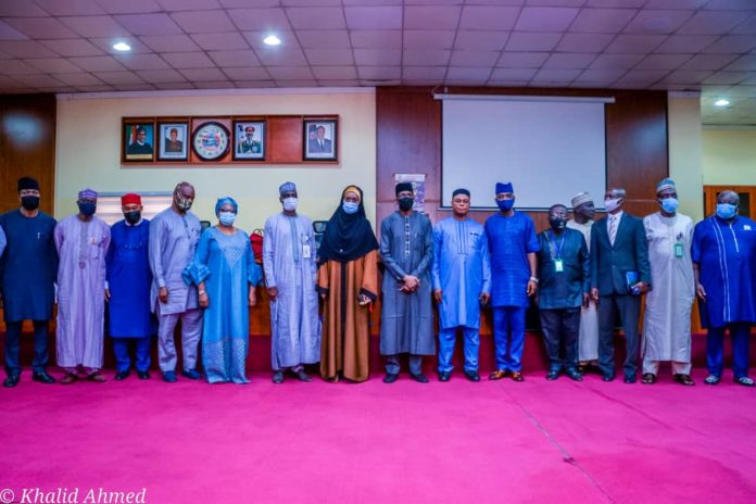 IMG-20210608-WA0001 (7th Left) The Honourable Minster of Humanitarian Affairs, Disaster Management and Social Development, Sadiya Umar Farouq, (8th Left) the Permanent Secretary of the Ministry, Bashir Nura Alkali, (6th Left) Director Humanitarian Affairs, Grema Ali Alhaji, (2nd Left) National Coordinator NSIP, Engr Umar B. Bindir, (4th Left) Director HRM, Abdulrahman Babatunde Jaji, (5th Left) Director Special Needs, Nkechi Onwukwe, (6th Right) Director Finance and Account, Matthew Dada (5th Right) Director Legal, Garba Haganawega, (7th Right) Director PRS, Repheal Obi, during the press briefing on the Shortlisting of N-Power Batch C Stream 1 and updates on other Social Investment Programmes, on the 8th June, 2021. In Abuja.