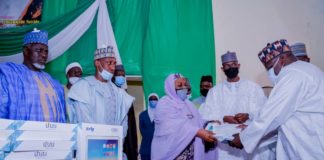 4th Left) The Representative of the Honourable Minster, Federal Ministry of Humanitarian Affairs, Disaster Management and Social Development, Sadiya Umar Farouq, the Permanent Secretary of the Ministry, Bashir Nura Alkali, (3rd Left) The Representative of Sokoto State Governor, Hajiya Kulu Abdullahi Sifawa, (2nd Left) Focal Person NSIP for Sokoto State, Hayatu Tafida, during the distribution of engagement letters and monitoring devices to Independent Monitors in Sokoto State, on 28th June 2021. In Sokoto.