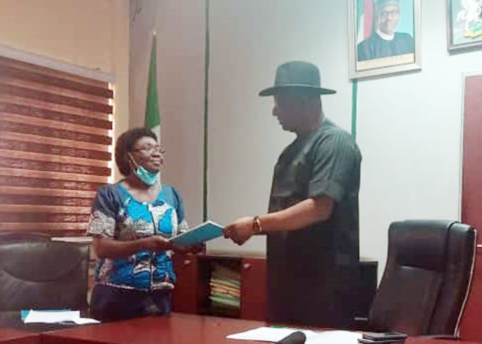Honourable Minister of State, Labour and Employment, Festus Keyamo, receiving the report of the Panel of Inquiry set up to investigate the death of Richard Gbadebo, from Chairman of the Panel and Director Occupational Safety and Health, Lauretta Nneka Adogu in Abuja Honourable Minister of State, Labour and Employment, Festus Keyamo, receiving the report of the Panel of Inquiry set up to investigate the death of Richard Gbadebo, from Chairman of the Panel and Director Occupational Safety and Health, Lauretta Nneka Adogu in Abuja
