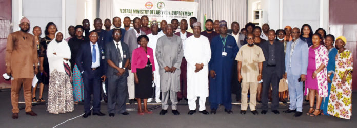 Permanent Secretary, Federal Ministry of Labour and Employment, Dr Yerima Peter Tarfa (8th right); Director, Reform Coordination and Service Improvement of the Ministry, Dr John O. Magbadelo; Director, Occupational Safety and Health, Mrs. Adogu Lauretta with resource persons and participants at a one day workshop for Reform Coordination and Service Improvement champions in Abuja