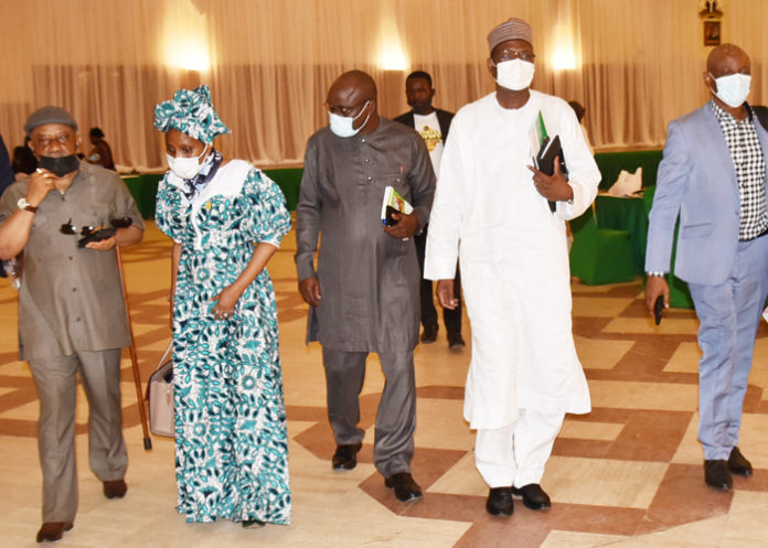 L-R: Honourable Minister of Labour and Employment, Dr Chris Ngige, Permanent Secretary, Federal Ministry of Labour, Dr Yerima Peter Tarfa (2nd right) after the meeting of Presidential Committee on Salaries, relevant Federal Government stakeholders and health sector professional associations and trade unions at State house.