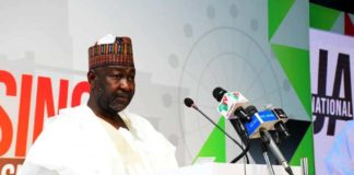 The Minister of State for Works and Housing Engineer Abubakar D Aliyu delivering his speech on behalf of the Honourable Minister of Works and Housing Mr Babatunde Raji Fashola SAN