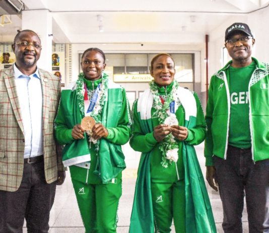 L-R: Hon. Minister, Fed. Ministry of Youth & Sports Devlpt. Mr. Sunday Dare (Led Team Nigeria Contingent Arrival); ESE Brume (Olympian-Bronze Medalist Long Jump); Blessing Oborududu (Olympian-Silver Medalist Wrestling); Mr. Nebeolisa Anako, Permanent Secretary(FMYSD) @ the Nnamdi Azikiwe Int'l Airport, Abuja-August 7, 2021