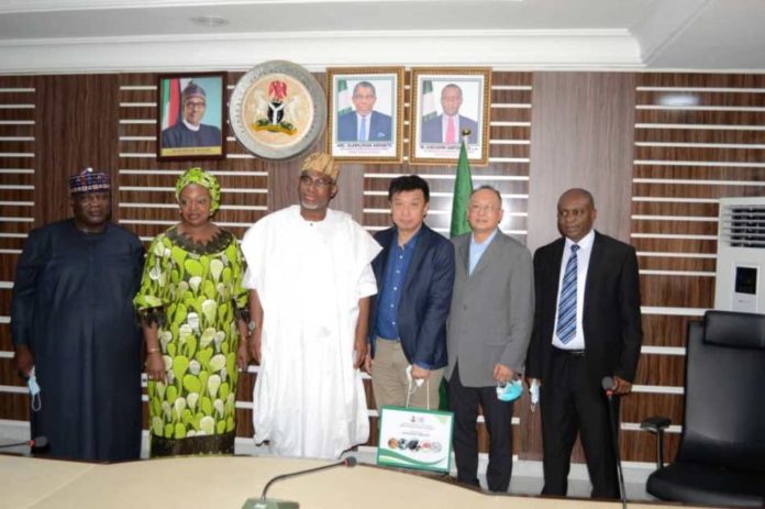Investment Promotion and Minerals Trade L - R: The Acting Director, Investment Promotion and Minerals Trade (IPMT), Ministry of Mines and Steel Development, Mr. Yunusa Mohammed, Permanent Secretary of the Ministry, Dr. Oluwatoyin Akinlade, Minister of Mines and Steel Development, Arc. Olamilekan Adegbite with the delegates from China Railway Investment Group Limited during their official visit to the Minister at the Ministry's Headquarters