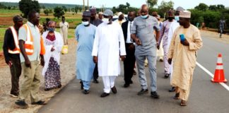 The Honourable Minister of State for Works and Housing, Engr. Abubakar D. Aliyu FNSE and his team during an inspection tour of Sokoto-Tambuwa-Gwandu-Aliero-Jega-Yawuri-Kotongora Road, (Pictures show On-going Lane Marking at the Kebbi Section of the Road)