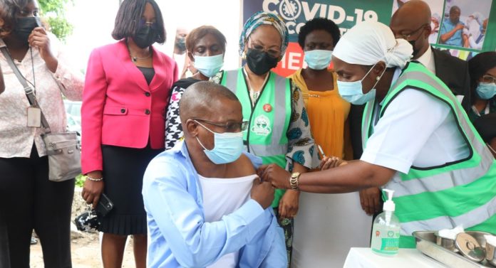 One of the recepients of the Moderna vaccine during the flag off of the 2nd Phase of National Covid-19 Vaccination at FMC Jabi (1)