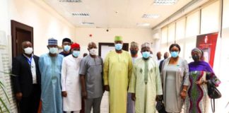 SGF, Boss Mustapha (4th R), EVC NASENI, Prof.M.S. Haruna (3rd R), PS, PEAO (OSGF), Andrew Adejo and other officials from NIRSAL & MECA during the courtesy visit to SGF