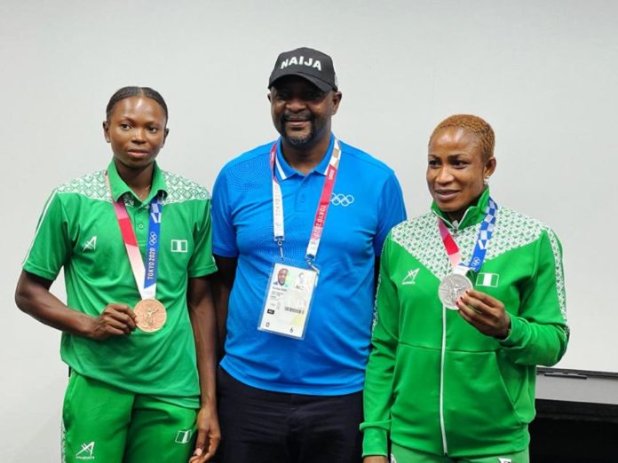 Silver Medalist Blessing Oborududu and bronze medalist Ese Brume with Sunday Dare
