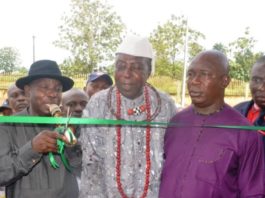 Director of Empowerment, Mr. Philip Ndiomu and Community leaders of Uwheru Community during the commissioning and handing over of block of six classrooms