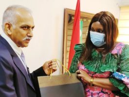 he Director of the Department of Joint Services, Ministry of Defence Mrs. Olu Mustapha presenting a souvenir to the Head of the Indian Delegation Lt. General Vinod Gulabroa Khandera, during the technical meeting