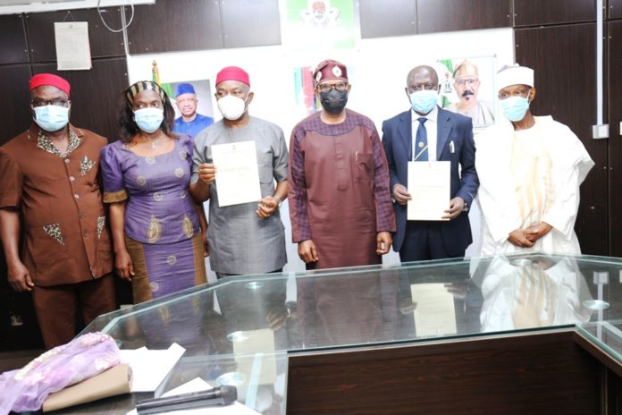 (Left) Dr. Kingsley Achigbu MD, FMC Owerri (Center) HMSH Dr. Olorunnimbe Mamora (Left) Dr. Abubakar Usman MD, FMC Bida