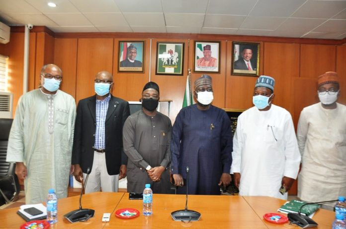right to left, the Hon. Minister of Power, Engr. Abubakar D. Aliyu, third; second right is the Minister of state for Power, Goddy Jedy-Agba and Second left is the Perm. Sec Power, Nebeolisa Anako while third left is the President of NAGCC